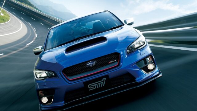 Subaru WRX STI S207 Racing on Scenic Mountain Road 4K Desktop Wallpaper
