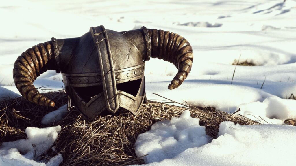 Epic Iron Helmet from Skyrim in Snowy Landscape PC Wallpaper