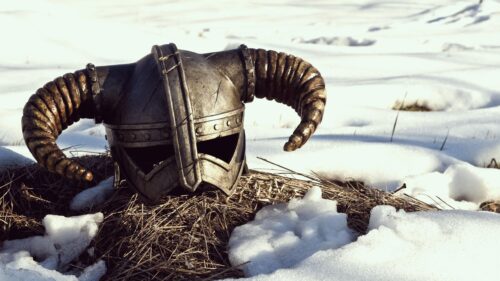 Epic Iron Helmet from Skyrim in Snowy Landscape PC Wallpaper