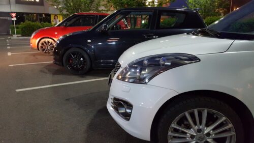 Suzuki Swift Trio Night Parking Scene Desktop Wallpaper