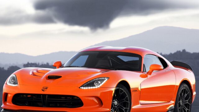 Bright Orange Dodge Viper TA Sports Car in Scenic Sunset 4K Desktop Wallpaper