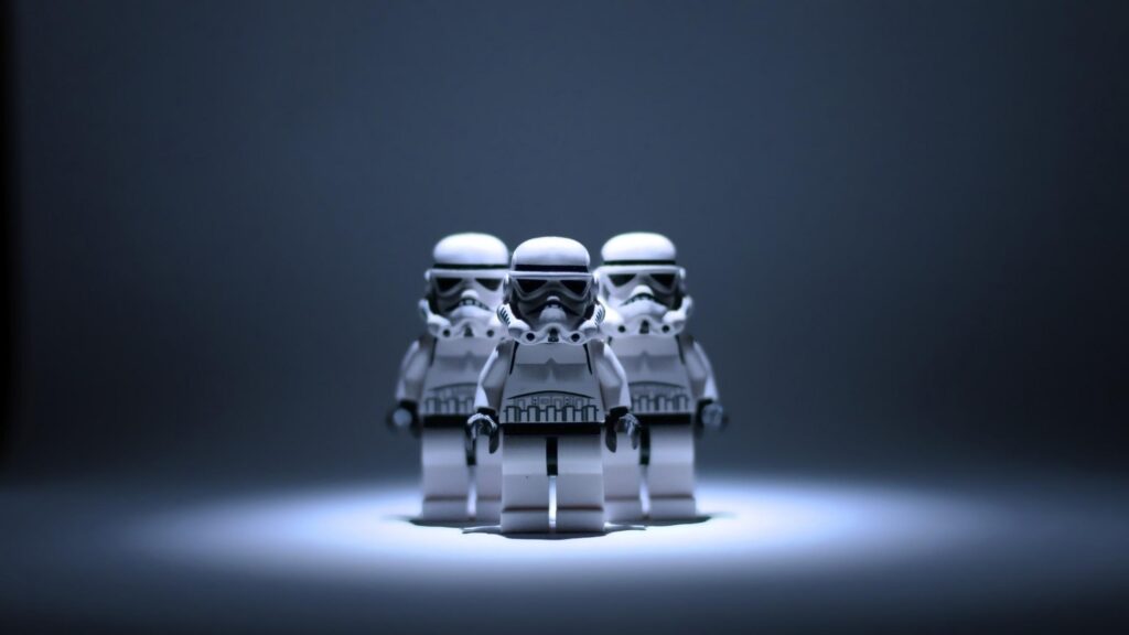 Minimalist Lego Stormtrooper Trio Cinematic Lighting 4K Desktop Wallpaper