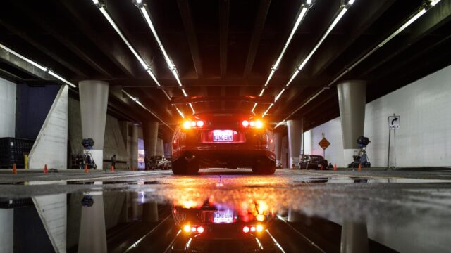 Red Toyota Supra MK4 Under Urban Bridge Night Lights 4K Wallpaper