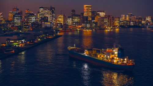 Stunning Tokyo Bay Night Skyline with Cargo Ship 4K Desktop Wallpaper