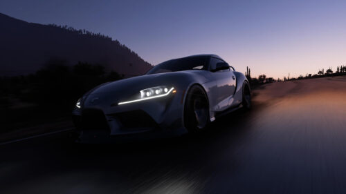 Toyota Supra GR Sports Car Driving at Twilight Desktop Wallpaper