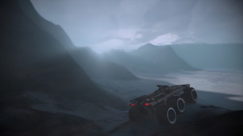Futuristic Sci-Fi Rover Exploring Misty Alien Mountain Landscape PC Wallpaper