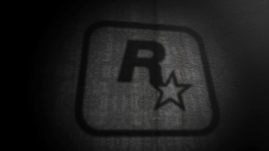 Rockstar Games Logo Dark Textured Concrete Wall 4K Desktop Wallpaper