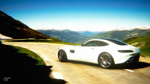 White Mercedes AMG GT Driving on Alpine Mountain Road 4K Wallpaper