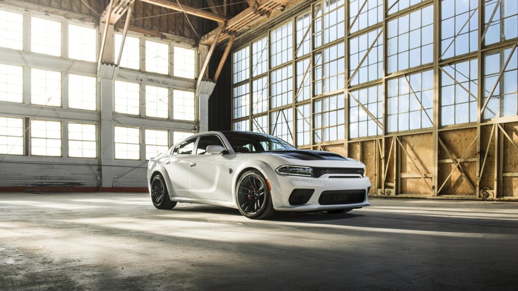 White Dodge Charger SRT Hellcat Widebody in Industrial Hangar PC Wallpaper