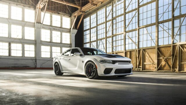 White Dodge Charger SRT Hellcat Widebody in Industrial Hangar PC Wallpaper