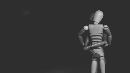 Minimalist Wooden Mannequin Couple Hugging Monochrome 4K Desktop Wallpaper