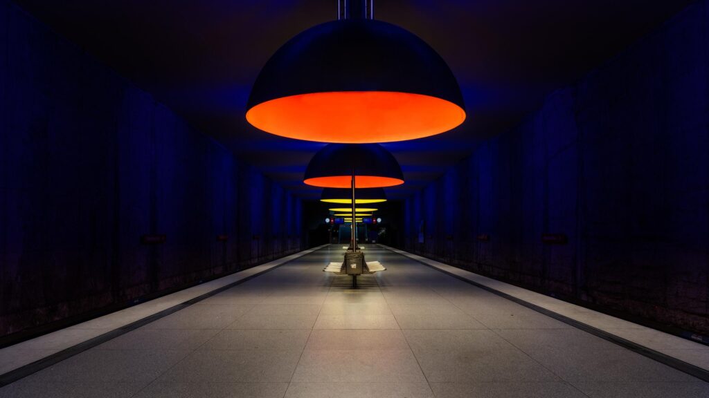 Minimalist Underground Subway Platform with Glowing Modern Lamps 4K Wallpaper