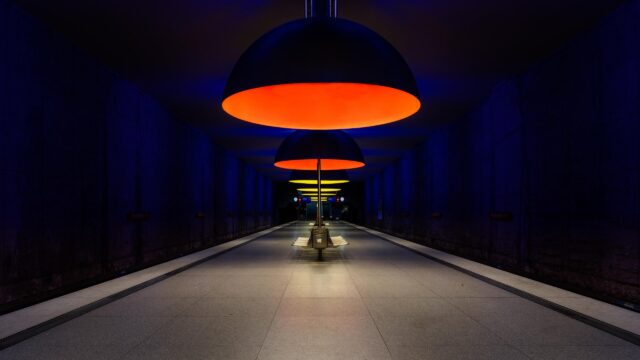Minimalist Underground Subway Platform with Glowing Modern Lamps 4K Wallpaper