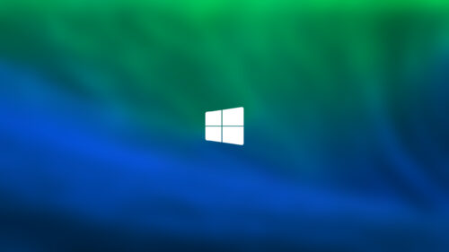 Minimalist Windows Logo on Abstract Blue and Green Gradient Desktop Wallpaper