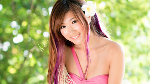 Beautiful Asian Woman with Purple Highlights and Flower Hair Accessory 4K Wallpaper
