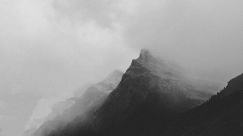 Misty Alpine Mountain Peak in Monochrome Desktop Wallpaper
