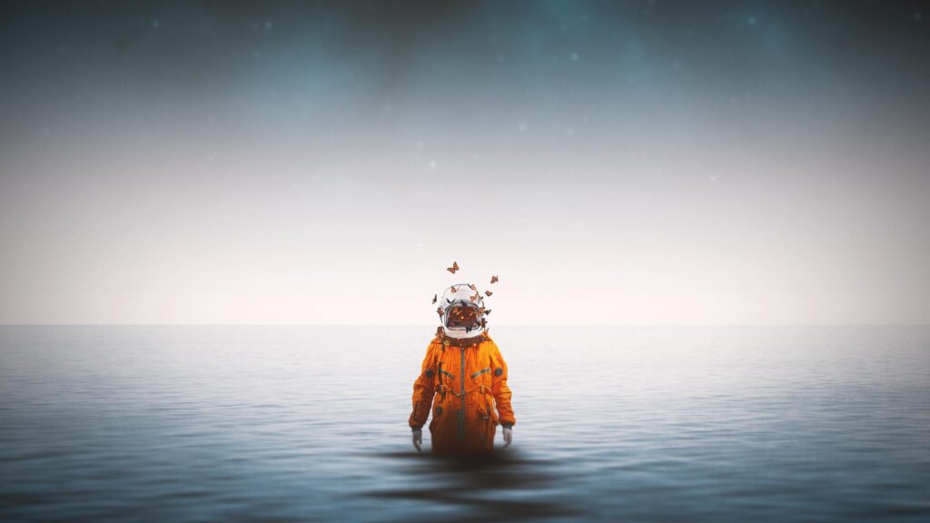 Surreal Astronaut with Butterflies in Orange Suit 4K Desktop Wallpaper