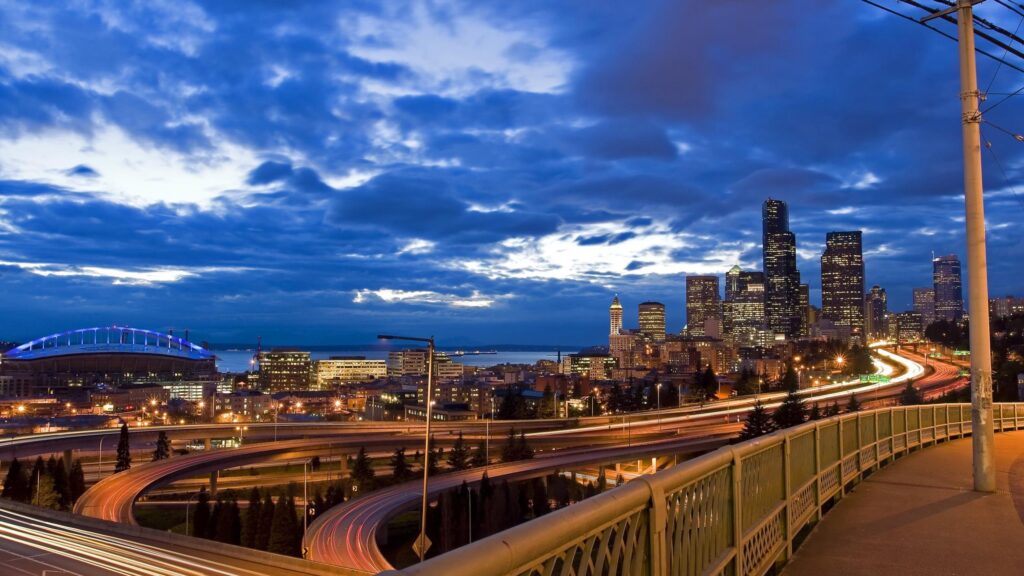 Stunning Seattle Skyline at Twilight with Light Trails Desktop Wallpaper