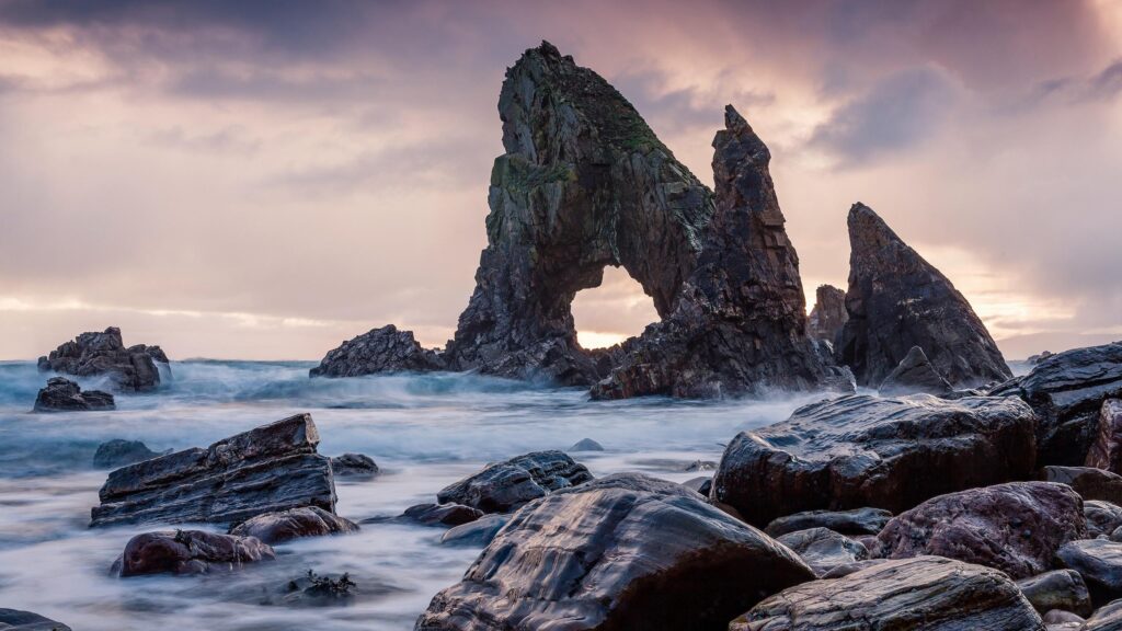 Dramatic Crohy Head Sea Arch at Sunset Desktop Wallpaper