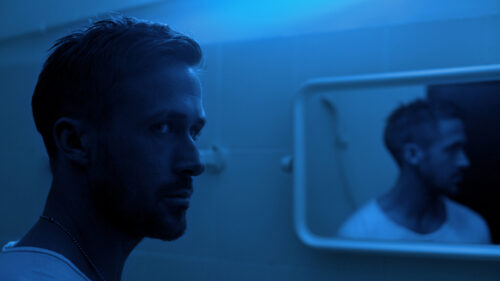 A Cinematic Portrait of a Man in Blue Lighting Desktop Wallpaper