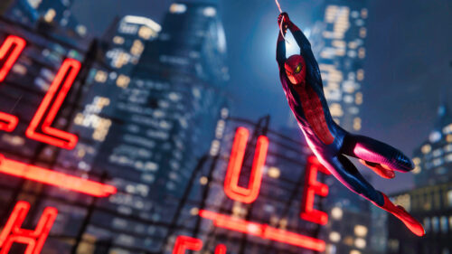 Spider-Man Swinging Past Neon Lights Desktop Wallpaper