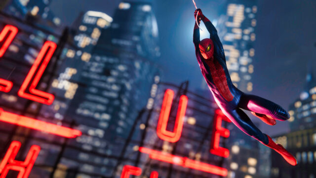 Spider-Man Swinging Past Neon Lights Desktop Wallpaper