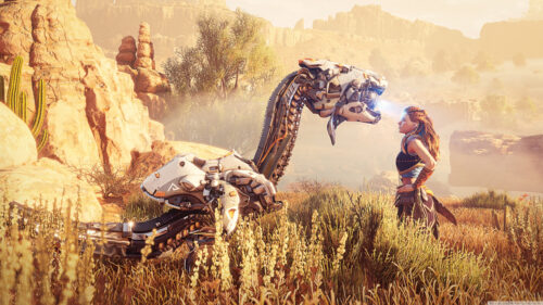 Aloy Facing a Machine in a Golden Desert Landscape Desktop Wallpaper