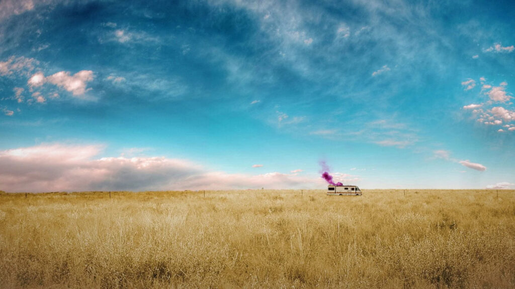 Minimalist RV in Vast Golden Field Desktop Wallpaper