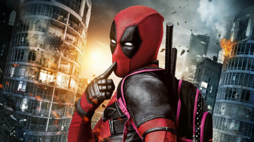 Deadpool Shushing Against Destroyed Cityscape PC Wallpaper