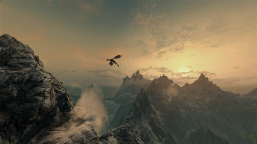 Dragon Soaring Over Snowy Peaks Desktop Wallpaper