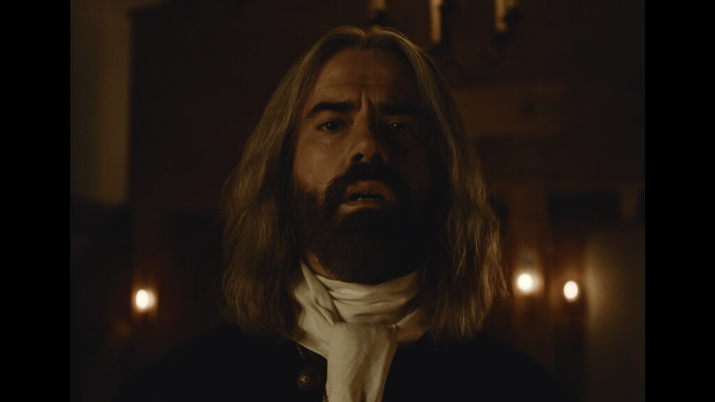 A Mysterious Man in Historical Attire Desktop Wallpaper