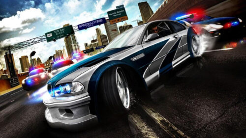 BMW M3 GTR in High Speed Police Pursuit PC Wallpaper