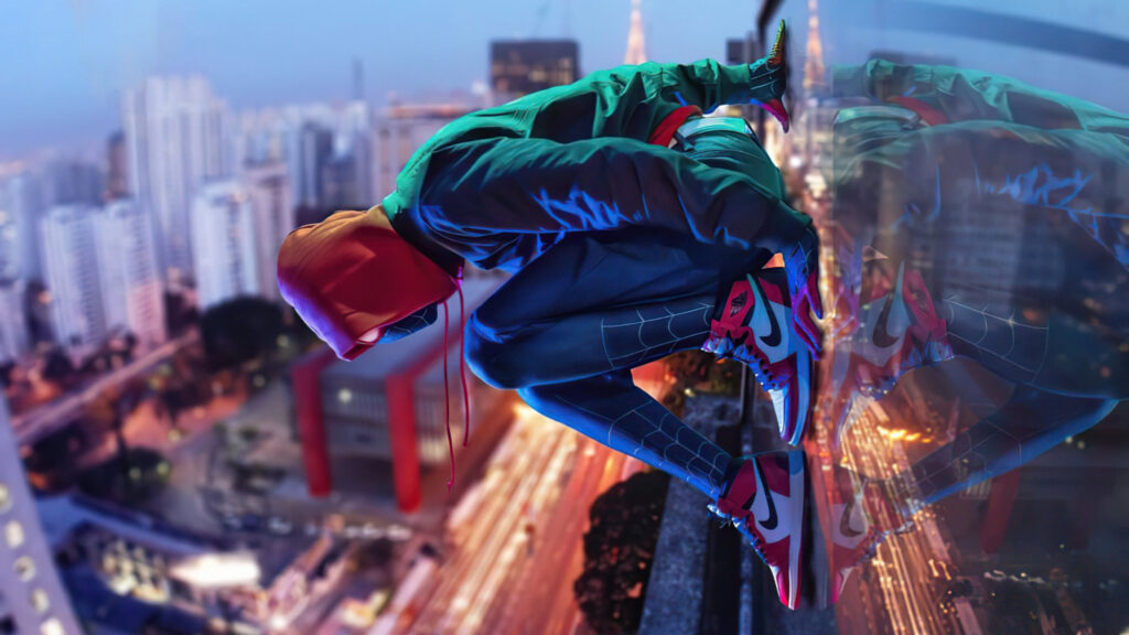 Spider-Man Crouching on Skyscraper City 4K Desktop Wallpaper