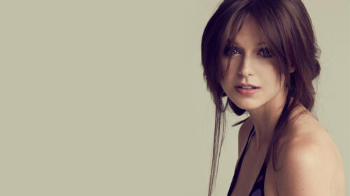 Stunning Portrait of a Woman with Brown Hair Desktop Wallpaper