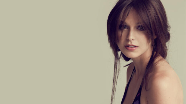 Stunning Portrait of a Woman with Brown Hair Desktop Wallpaper