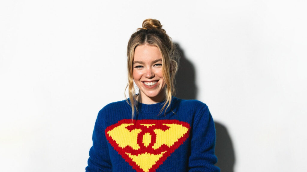Milly Alcock Wearing Superman Chanel Sweater Desktop Wallpaper