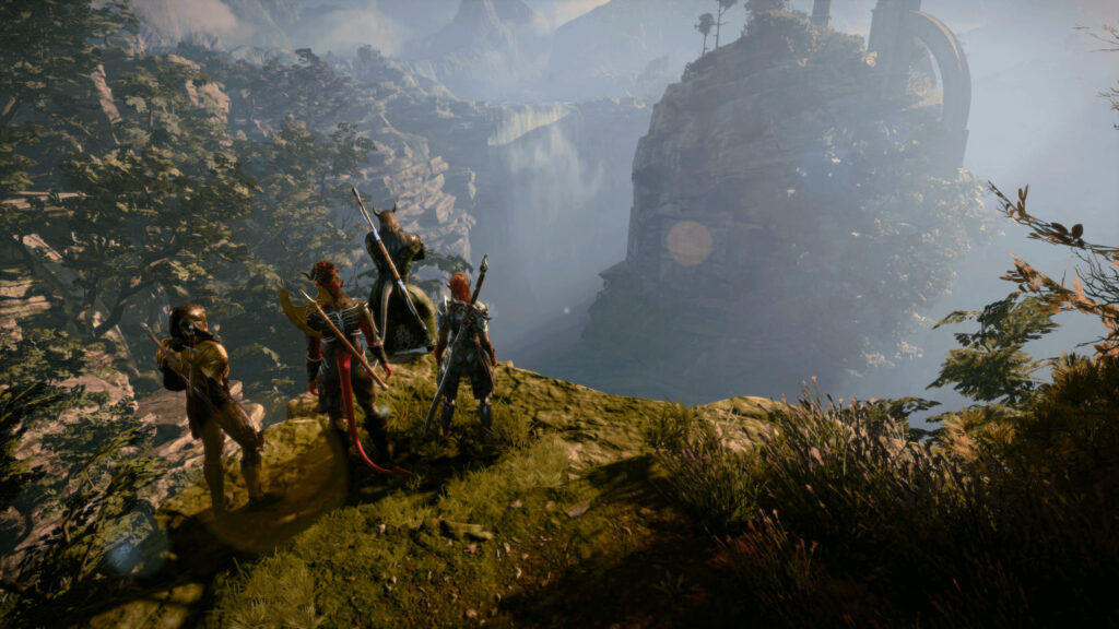 Four Fantasy Heroes Overlooking a Misty Waterfall Desktop Wallpaper