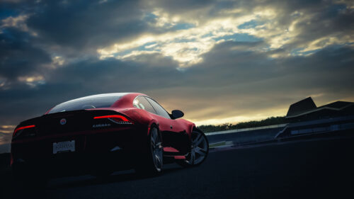 Red Karma GS Sports Car Rear View Sunset Track Desktop Wallpaper