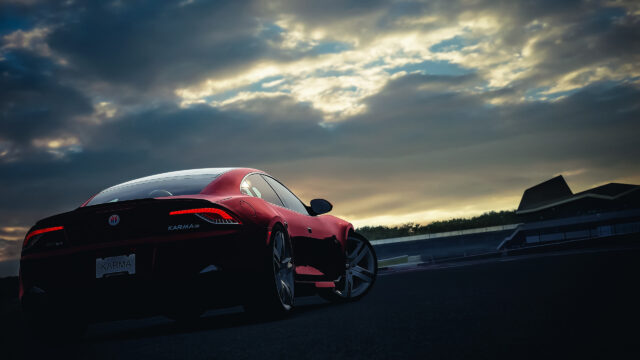 Red Karma GS Sports Car Rear View Sunset Track Desktop Wallpaper