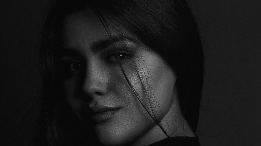 Elegant Monochrome Portrait of a Young Woman Desktop Wallpaper