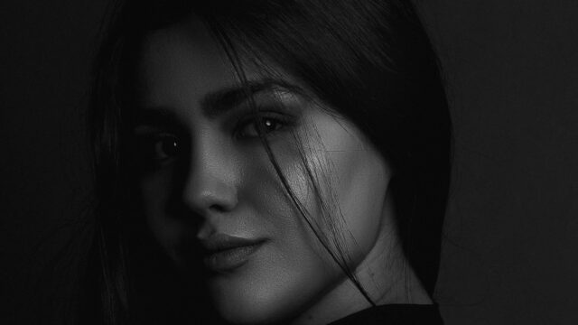 Elegant Monochrome Portrait of a Young Woman Desktop Wallpaper