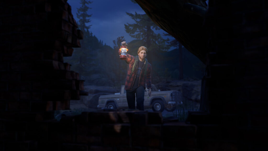 Man Holding Lantern in Dark Woods 4K Desktop Wallpaper
