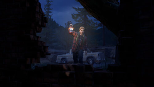 Man Holding Lantern in Dark Woods 4K Desktop Wallpaper