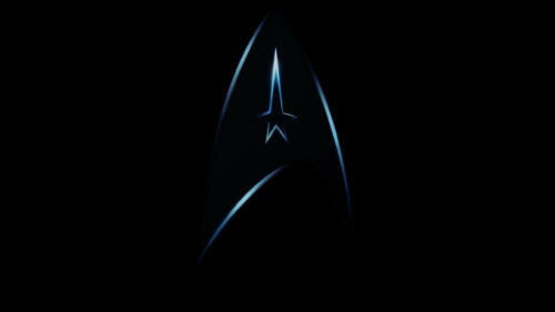 Dark Minimalist Sci-Fi Star Emblem Desktop Wallpaper