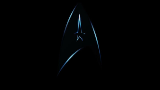 Dark Minimalist Sci-Fi Star Emblem Desktop Wallpaper