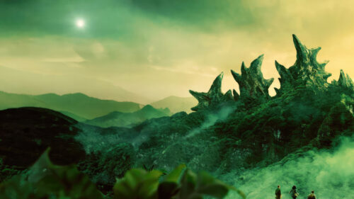 Godzilla Emerging From Lush Mountainside 4K Wallpaper