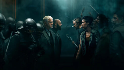 Cinematic Confrontation Between Authorities and Rebels Desktop Wallpaper