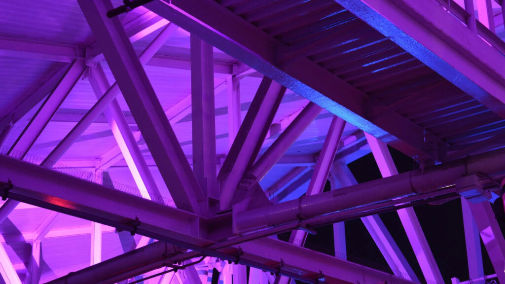 Purple Illuminated Steel Construction Desktop Wallpaper