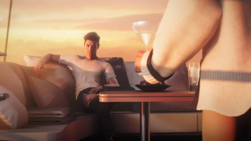 Romantic Sunset View Man on Couch Desktop Wallpaper