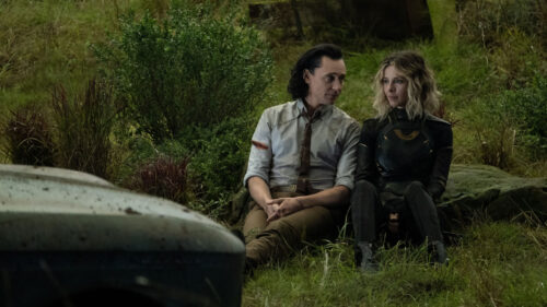 Loki and Sylvie Sitting in Nature Desktop Wallpaper